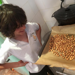 Emma's son making hazelnut spread