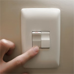 photo of light switch being switch on