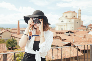 lady taking photograph on holiday